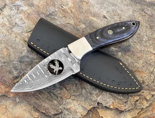 8" Damascus steel fixed blade knife with Black Pakka wood handle.