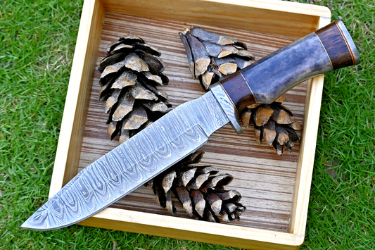 Wilderness Explorer: Hunting Bowie Knife with Damascus Steel Blade, Colored Bone and Rosewood Handle, Damascus Guard, and Leather Sheath