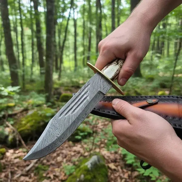 Handmade Damascus Bowie Knife – Stag Antler Handle, Brass Guard & Leather Sheath